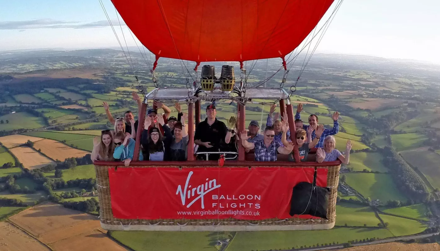 Passengers enjoying views during a hot air balloon flight